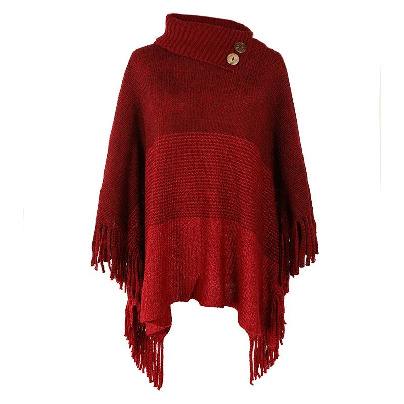 Poncho met col en knopen