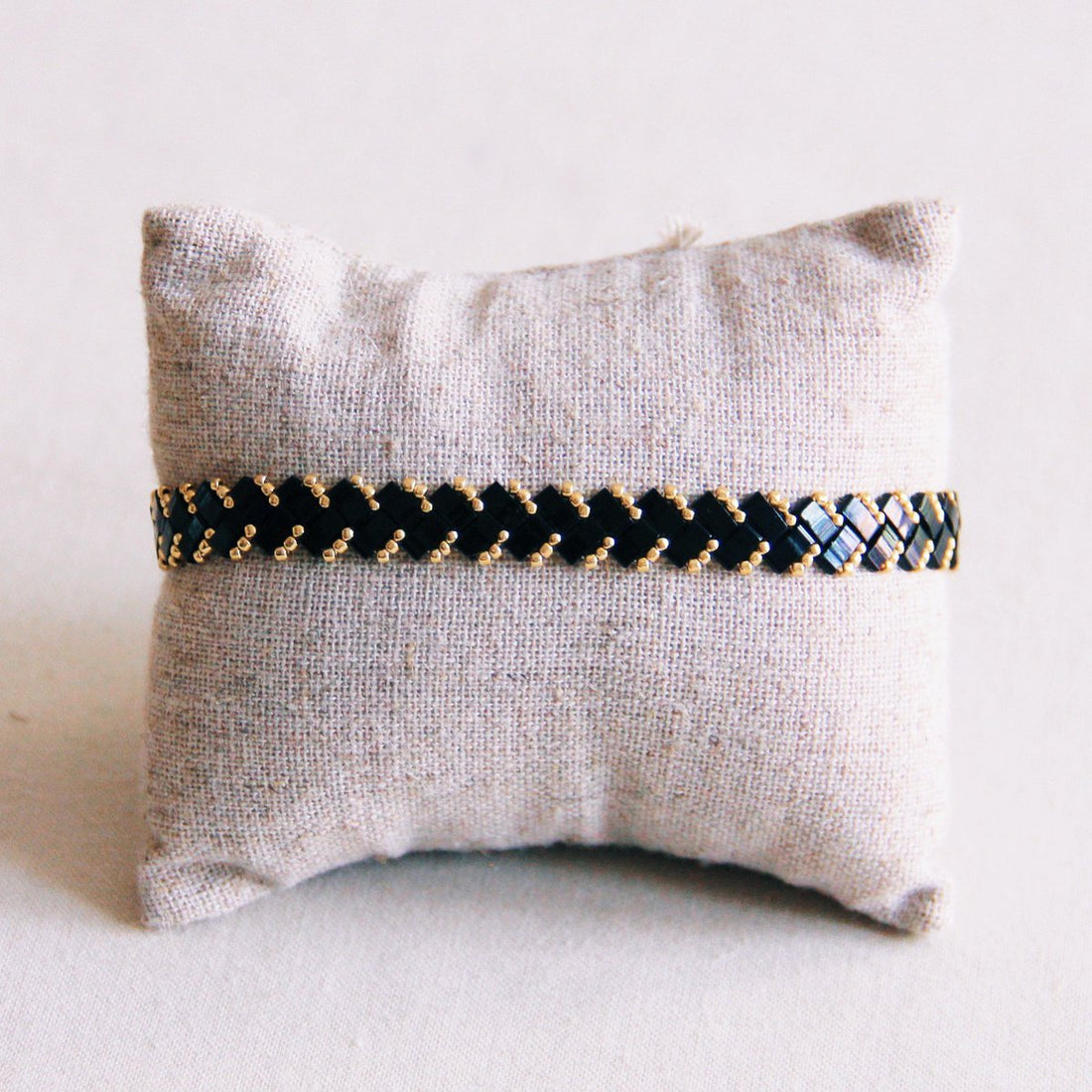 Gevlochten Tila Kralenarmband - Zwart/Goud
