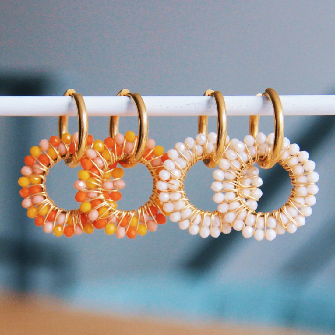 Edelstaal oorbel met facet hanger – zonsopgangkleuren/goud