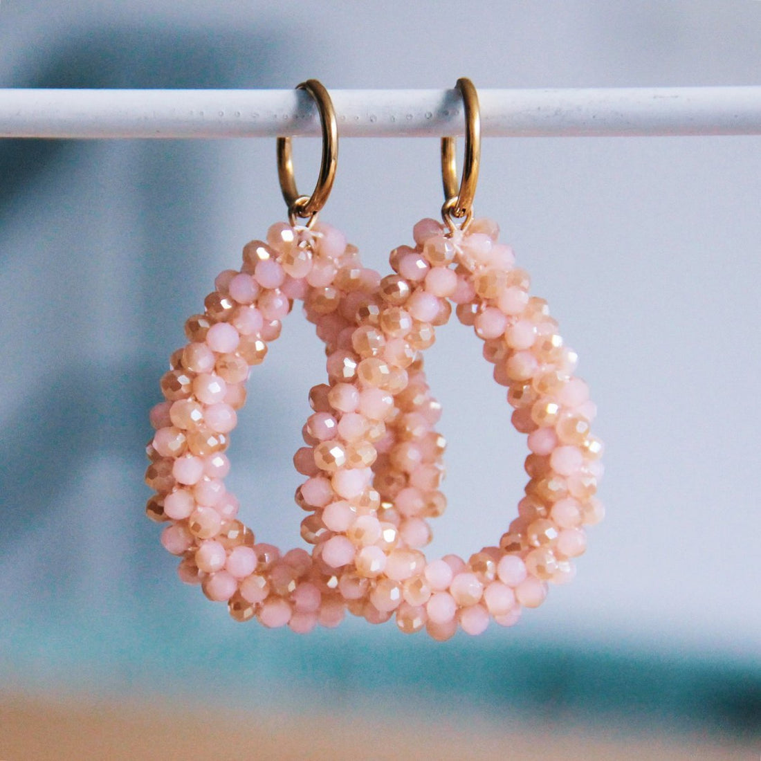 Rvs oorbel  - peach pink/goud