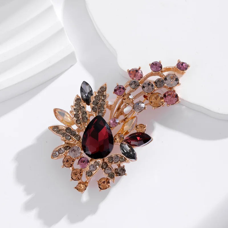 Broche bloem donker rood antreciet